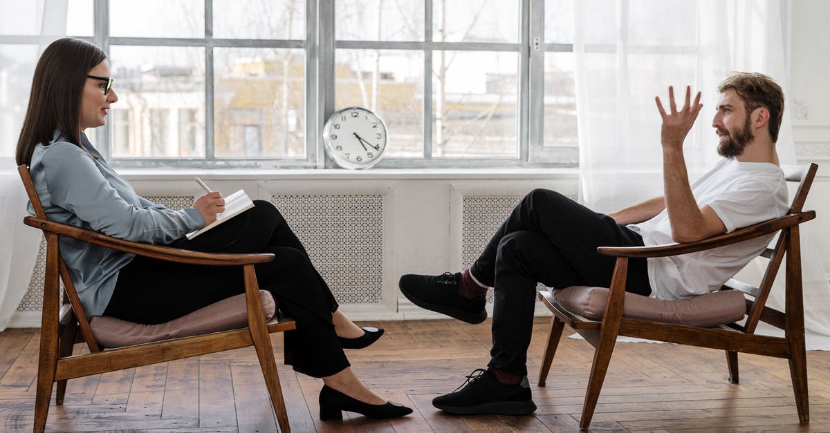 Some advice on knives - Person in Black Pants and Black Shoes Sitting on Brown Wooden Chair