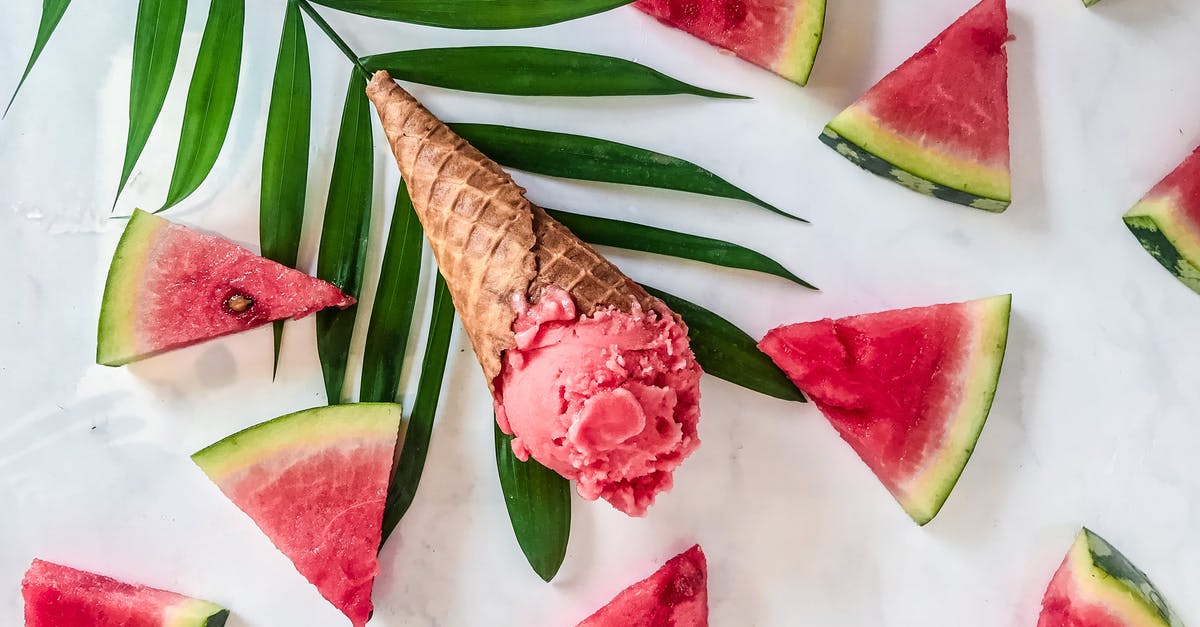 Sorbet tastes less sweet when frozen? - Ice cream cone on leaf among watermelon wedge