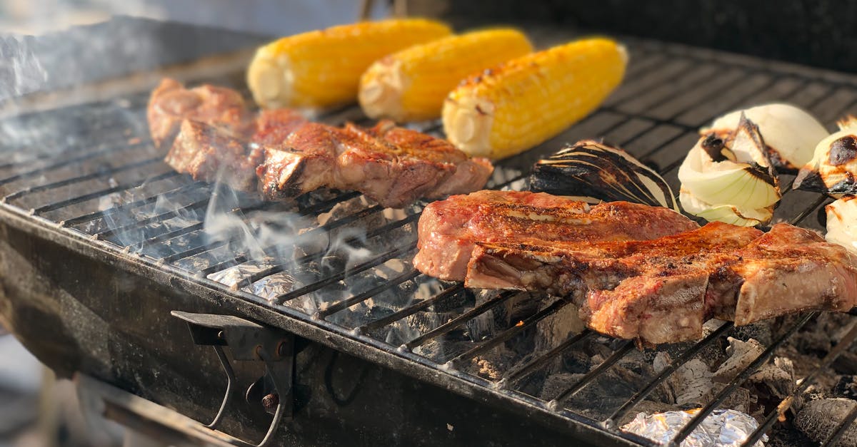Source for comestible cracked corn - Grilled Meat on Black Charcoal Grill