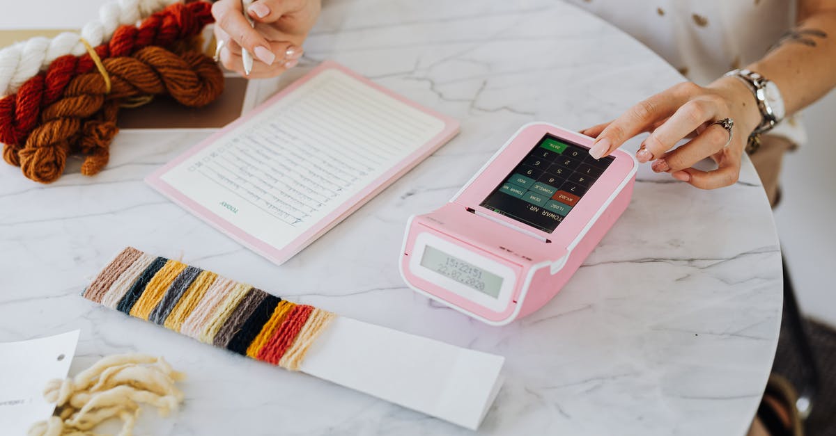 Sourdough calculator - Person Holding Pink and White Digital Device