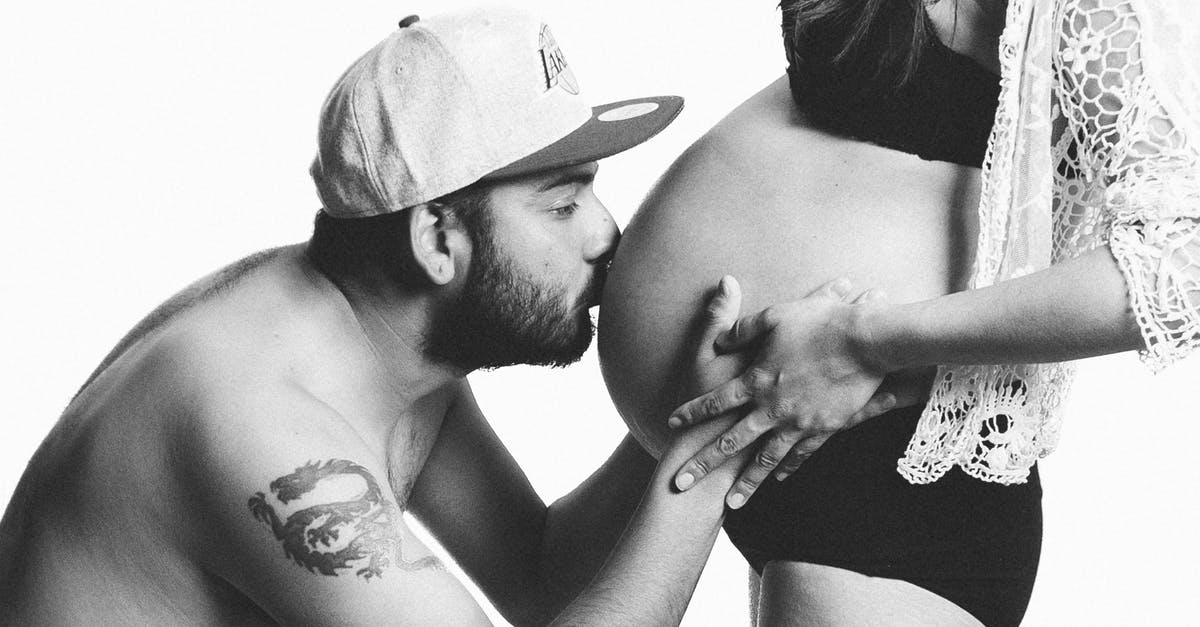 Sous vide pasteurization for pregnant wife - Grayscale Photography of Man Kissing Woman's Pregnant Bell