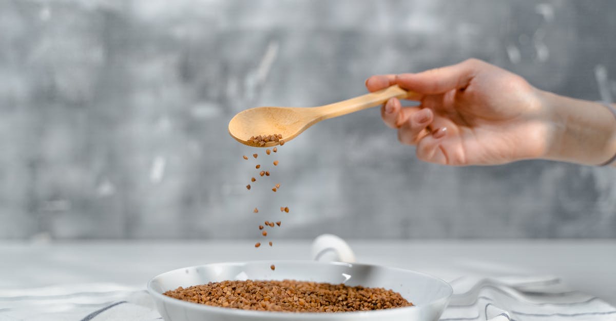 Spice blend replacement? - Person Holding Brown Wooden Spoon With White Powder