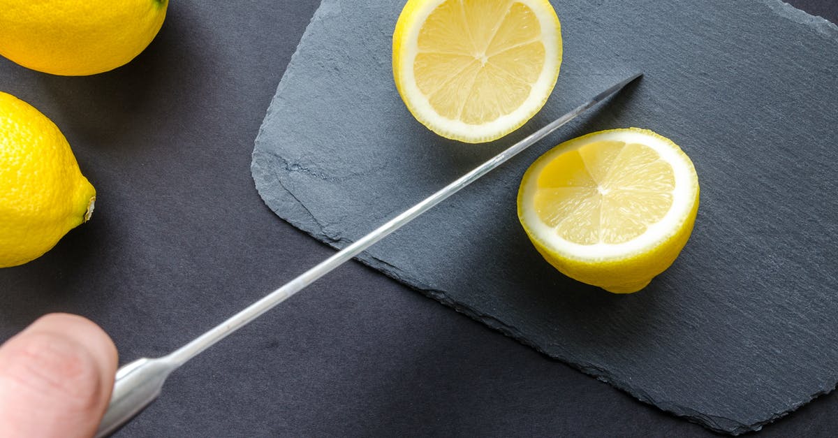 Stained Knife Blade - Photo of Sliced Lemon