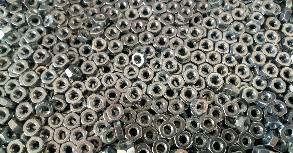 Stainless Steel Pan -- gray bottom. Why? - Pile of Silver Hex Nuts