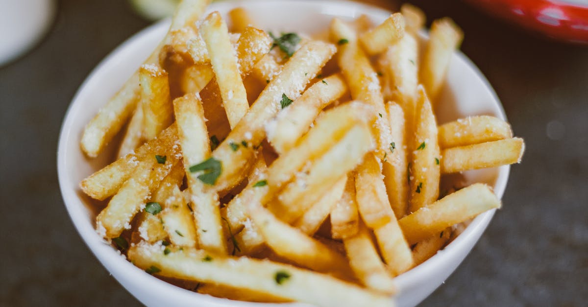 standard way to make crispy sweet potato fries? - Potato Fries on White Ceramic Bowl