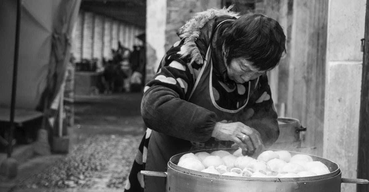 Steaming and steam temperature - Woman Standing and Arranging Buns