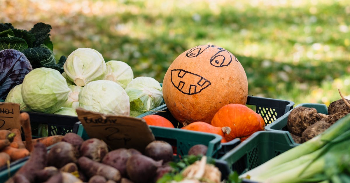 steaming cabbage - Brown and White Round Fruits on Green Plastic Crate