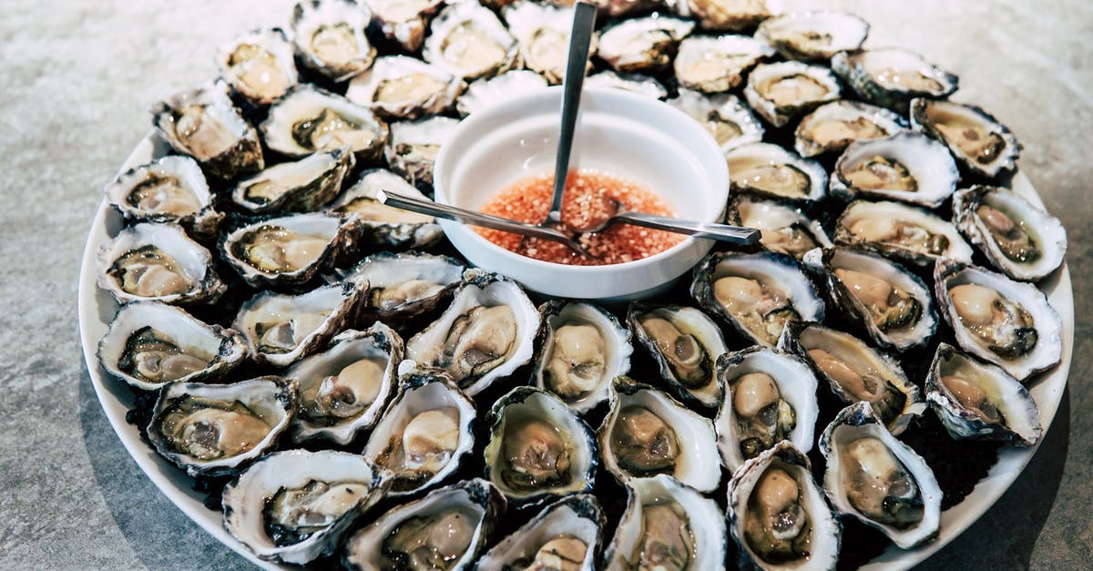 Steaming oysters without shucking meat v. just shucked oyster meat? - Oysters on Plate