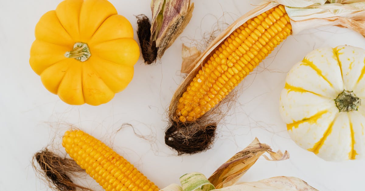 Steaming vegetables in microwave - Close-up of Corn Cobs and Pumpkins