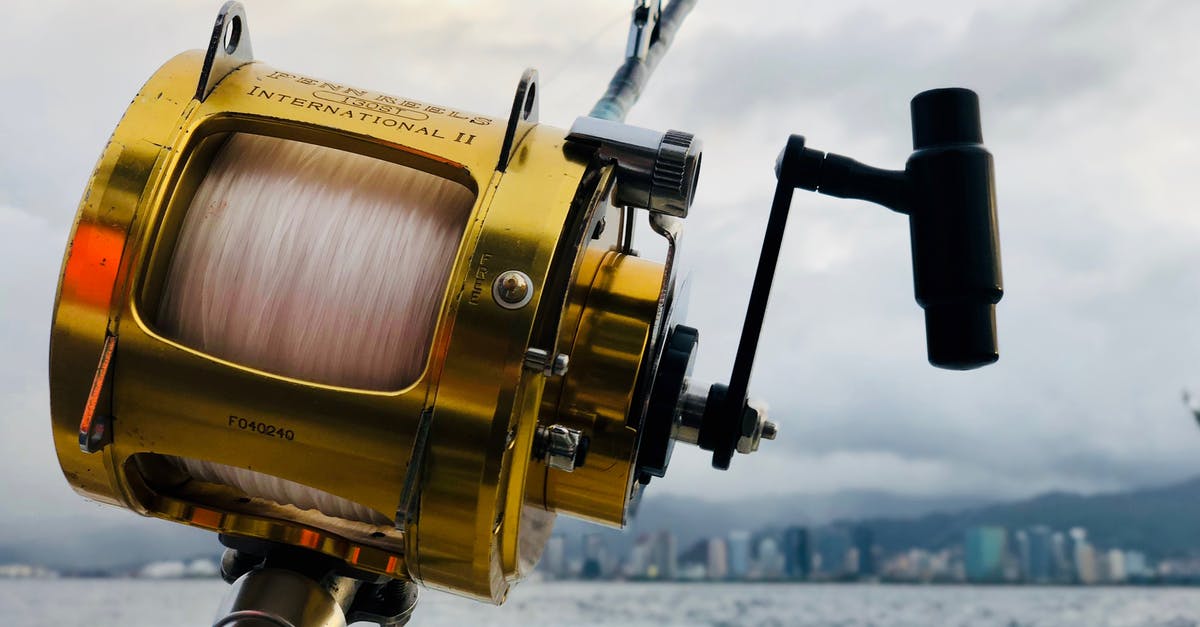 Steel honing rod vs ceramic honing rod - Selective Focus of Brown Fishing Reel