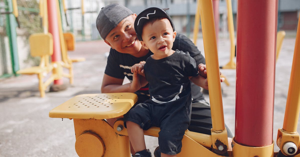 Steelhead Salmon's Mercury content - Father and cute son on playground