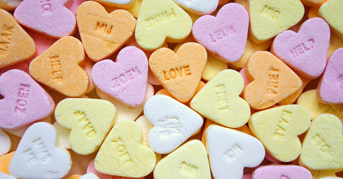Sticky, tacky texture with less sweetness? - Yellow Pink Orange and White Loves Heart Candies