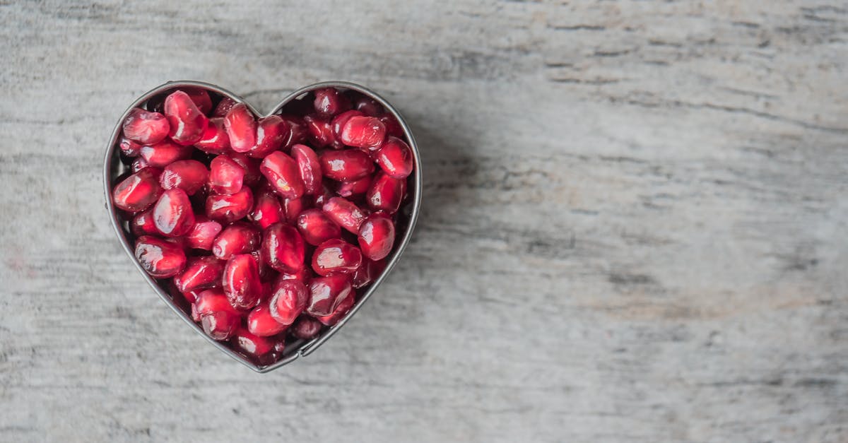 Sticky, tacky texture with less sweetness? - Silver Heart Bowl Filled of Red Pomegranate Seeds