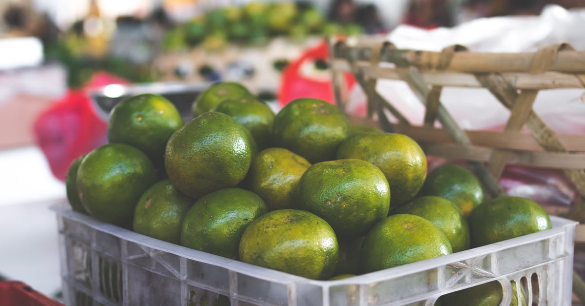 Stock tastes bony - Crate of Round Green Fruits