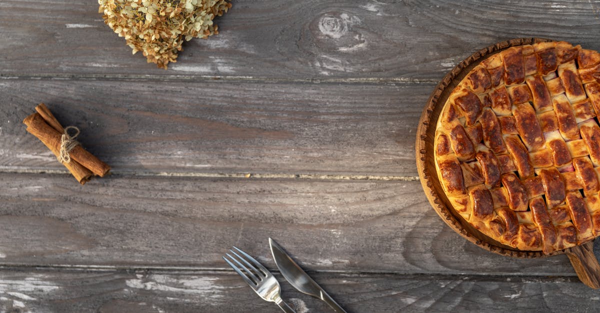 Storage of Sweet Potato Pie - Rustic Pie and Cinnamon on Table