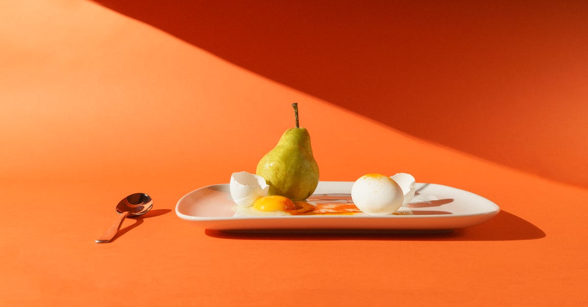 Store cracked eggs for a week? - Photo of a Pear and Eggs on a Plate