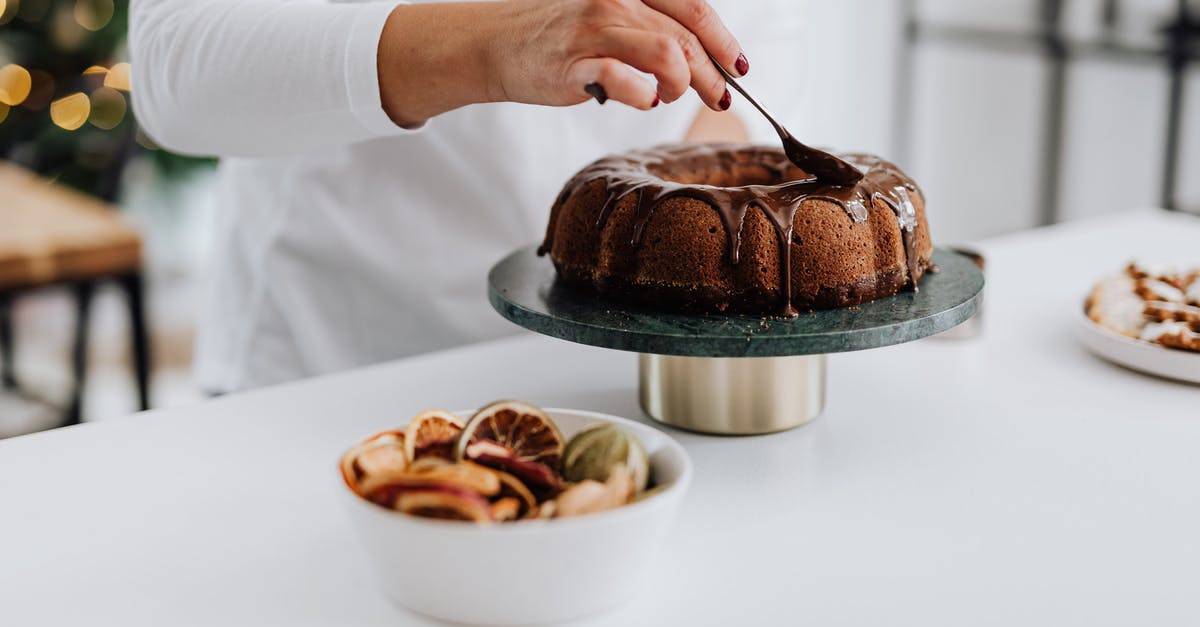 Storing bechamel sauce - Person Holding a Chocolate Cake