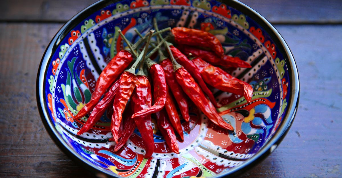 Storing dried peppers - Red Chilies on Blue Ceramic Bowl