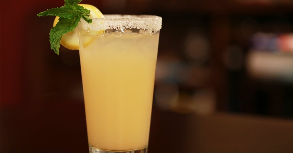 Storing lemon juice with crushed mint - Lemon Juice on Selective Focus Photography