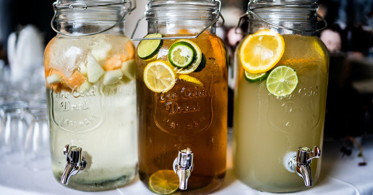 Storing lemon juice with crushed mint - Three Juice Jar Dispensers