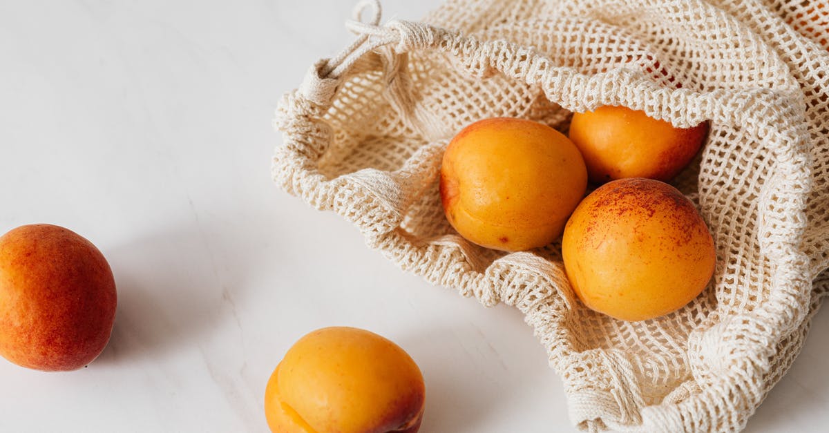 Storing peaches - Orange Fruit on White Marble