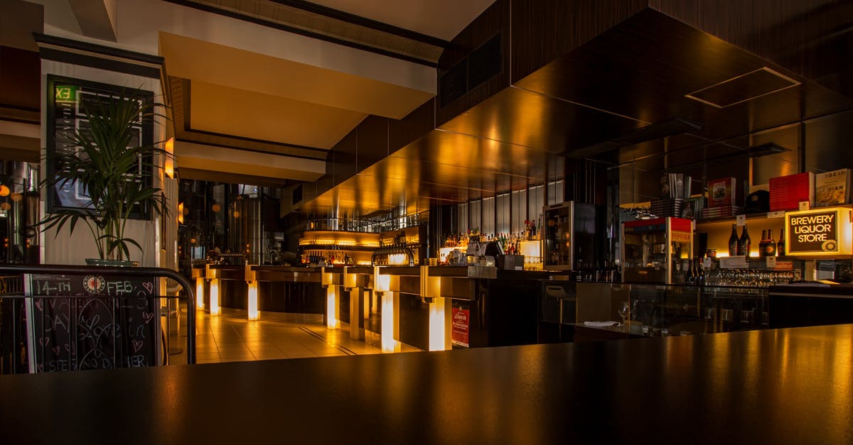 Storing sourdough starters with wine in a wine fridge? - Empty Bar Filled With Lights