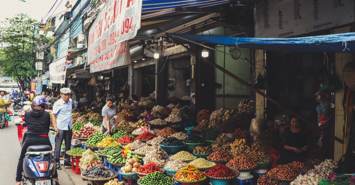 Storing spices against mold - Person in Scooter in Front of Vegetables