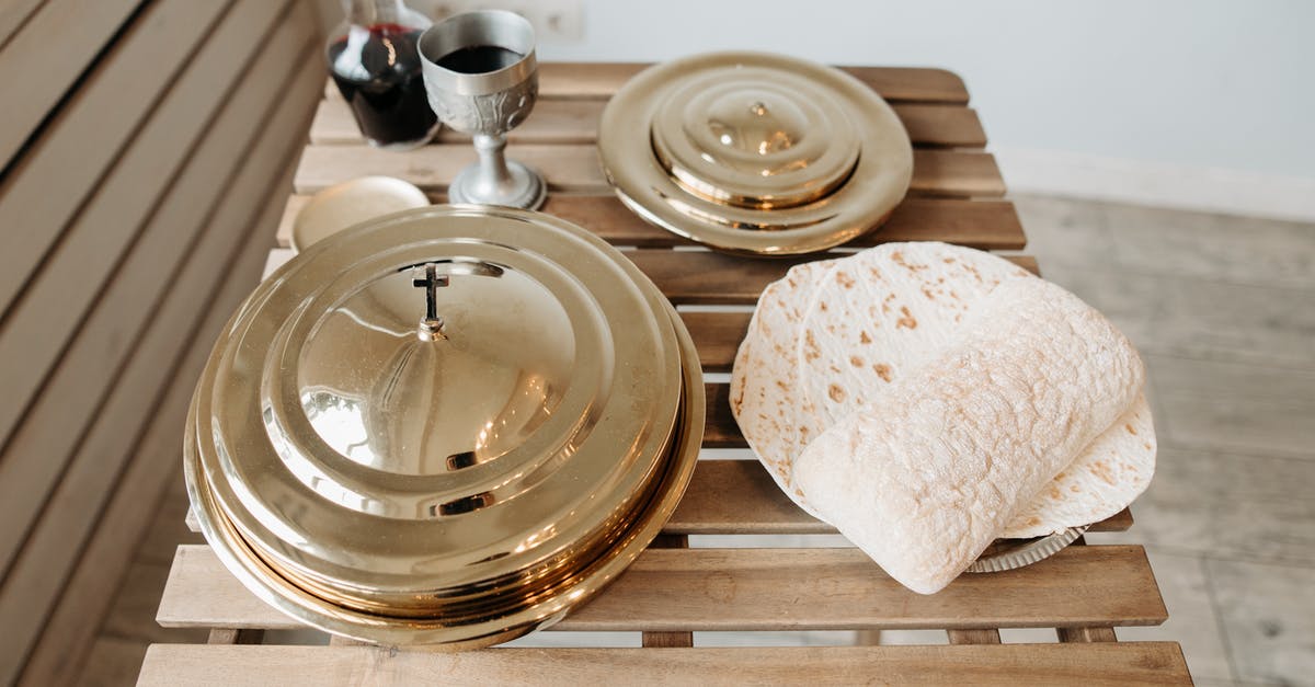 Stretchy Lebanese flatbread? - Flatbread and Red Wine on Wooden Table