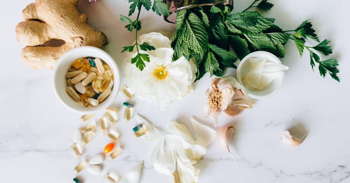 Structure of tomato, ginger and garlic after blending in a blender - Flat Lay Photo of Alternative Medicines