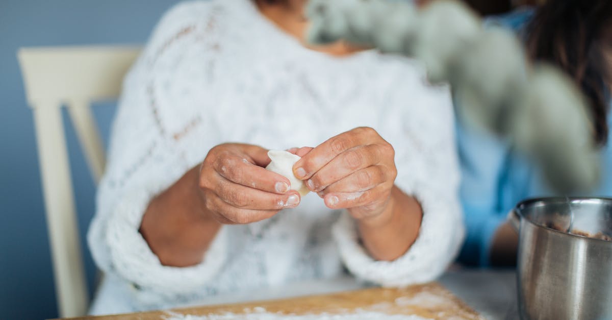 Stuffed Dumpling Made with Rice Flour - Woman Making Dumplings