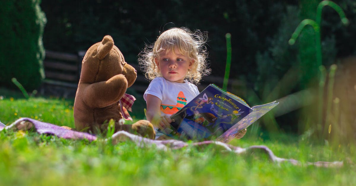 Stuffing bread for the next day - Girl Sitting Beside A Teddy Bear