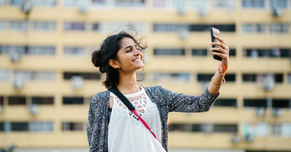 Substitute for a Standing Mixer using a paddle - Smiling Woman Holding Black Smartphone