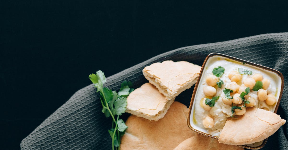 substitute for chickpeas in "bean blondies" - Close-Up Photo of Bread Dipped in Hummus