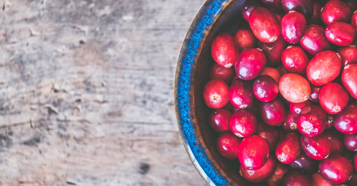 Substitute frozen cranberries for fresh berries - Bowl of Red Round Fruits