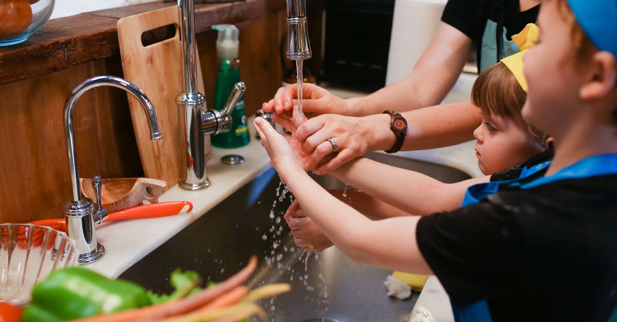 Substitute Sherry for Wine in Sour dough cookies? - Woman in Black Shirt Washing Her Hands