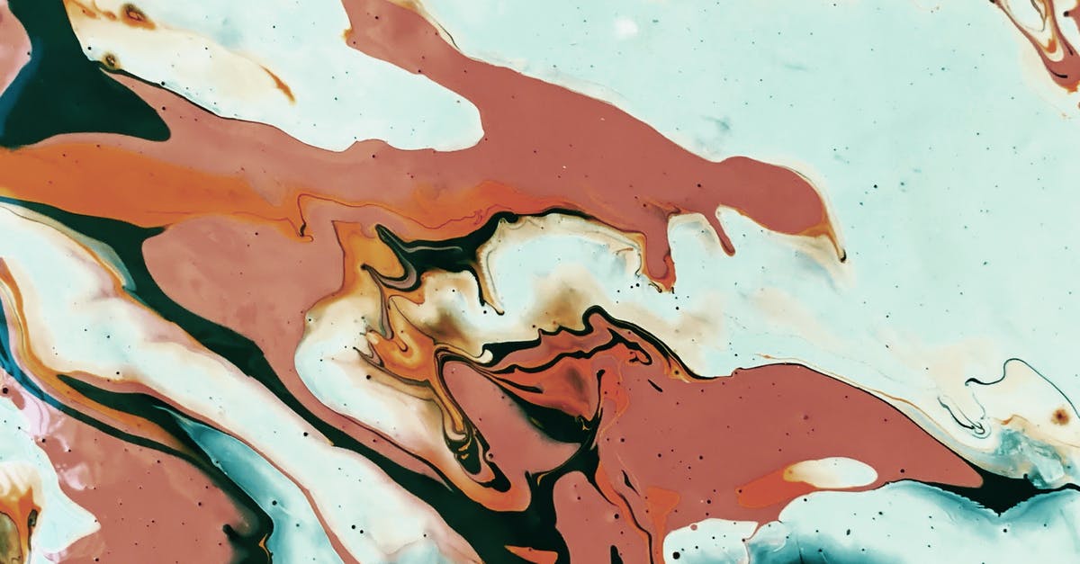 Substituting vegetable oil spread for oil in cake mix - Abstract background of spills brown and turquoise paints