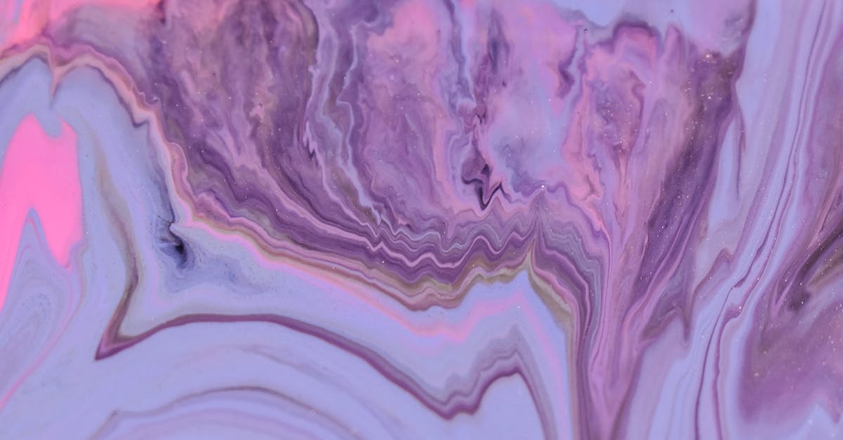 Substituting vegetable oil spread for oil in cake mix - Abstract background of artwork representing pink and purple acrylic paint fluids with thin waves