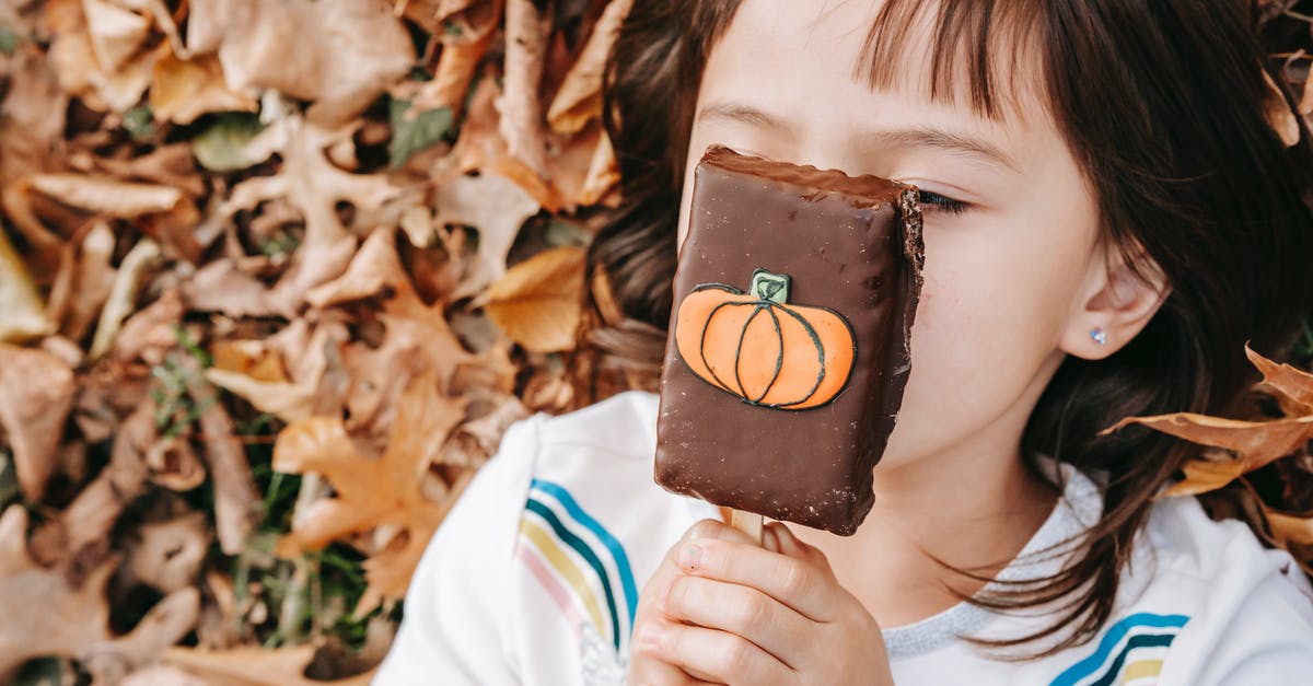 Substituting white chocolate in Julia Child's mousse - Little girl with Halloween gingerbread