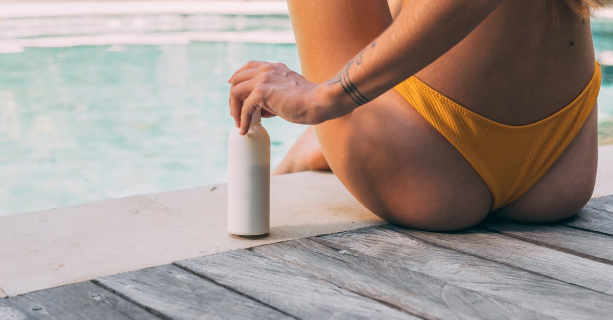 substitution of whipping cream for water in jello - Woman in Yellow Bikini Bottom Holding White Plastic Bottle