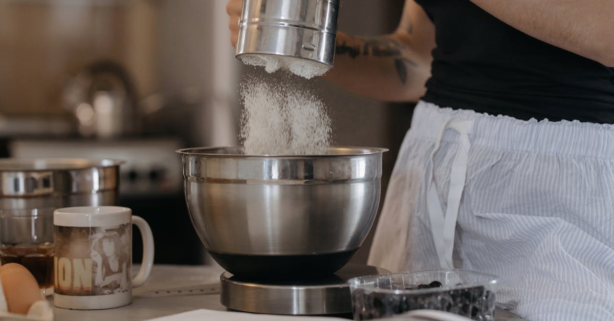 Sugar in tea better if put after boiling - Stainless Steel Cup on Brown Wooden Table