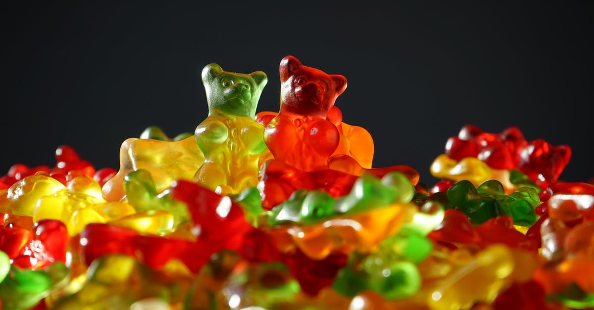 Sugar/Citric Acid Coating giving Gummy Bears a Wet Look - Pile of Assorted-color Bear Toy Lot