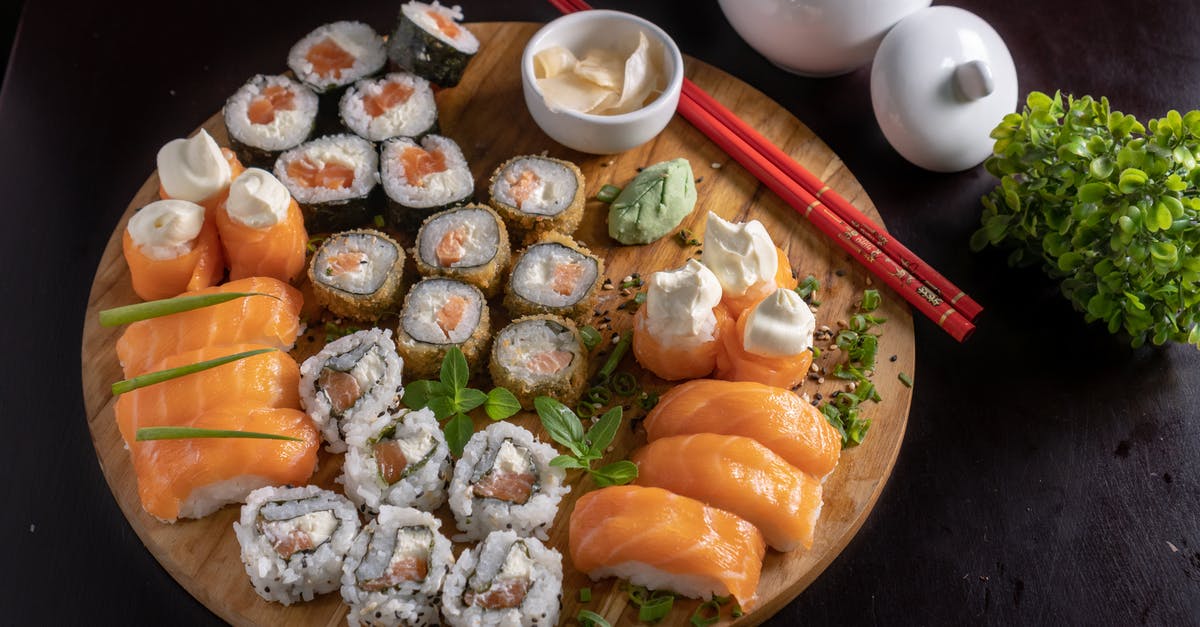 Sushi / sashimi knives - Japanese Sushi and Sashimi on Wooden Tray