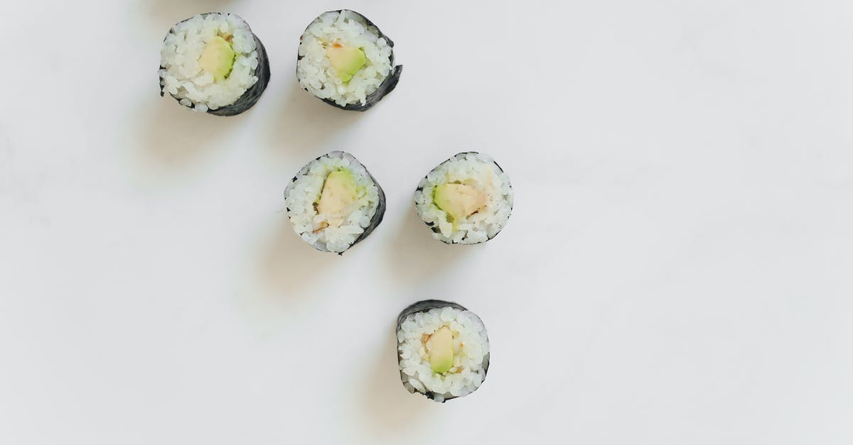 Sushi rolls keep getting thin - White and Green Round Fruit