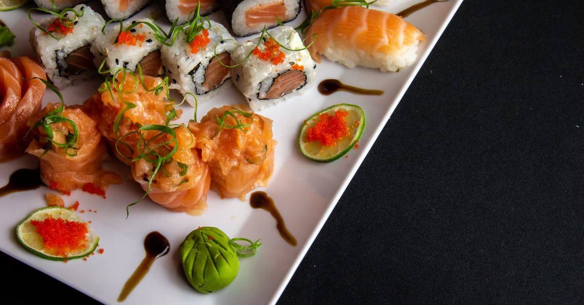 Sushi Salmon left uncovered overnight in fridge safe to eat? - White Ceramic Plate Filled With Sushi