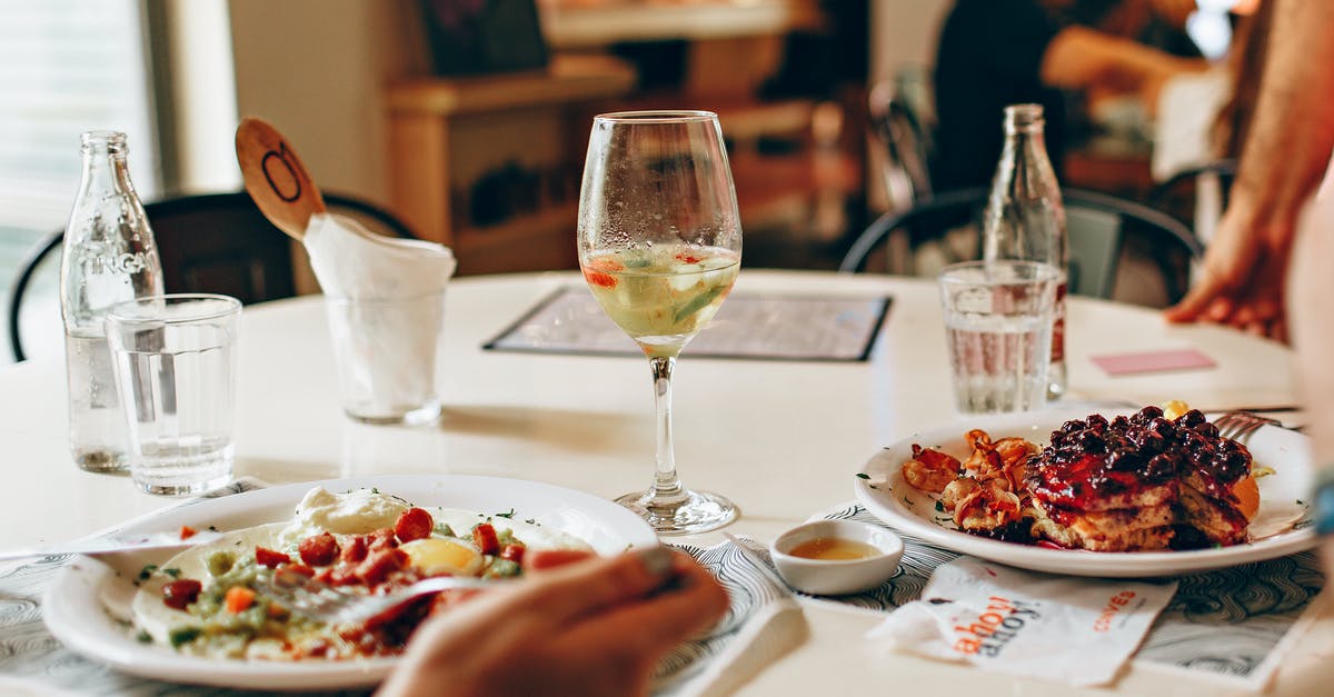 Swedish/Finnish dinner pancakes - Wine in Clear Glass Near Food on Plate on Table