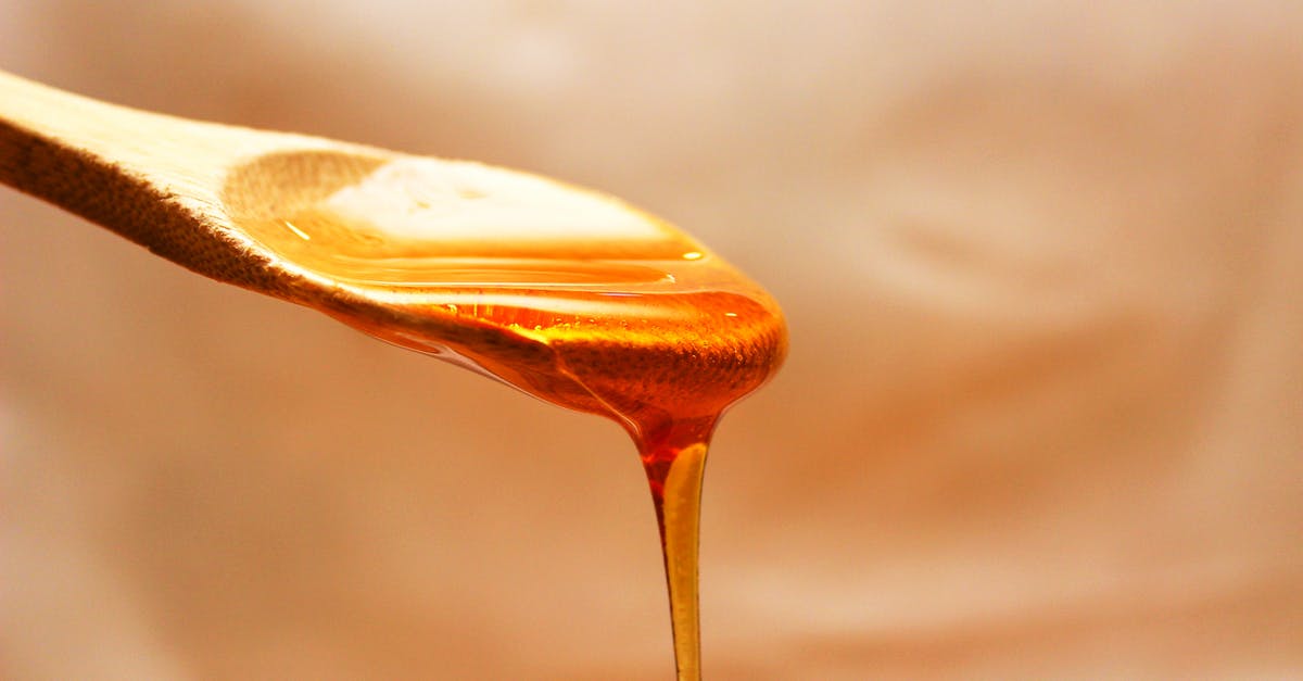 Sweet and sticky potato - Close-up Photography of Honey