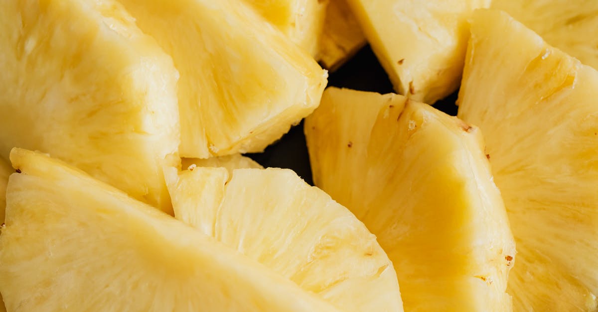 Sweet Potatoes going black when peeled - Halves of fresh ripe sliced pineapple