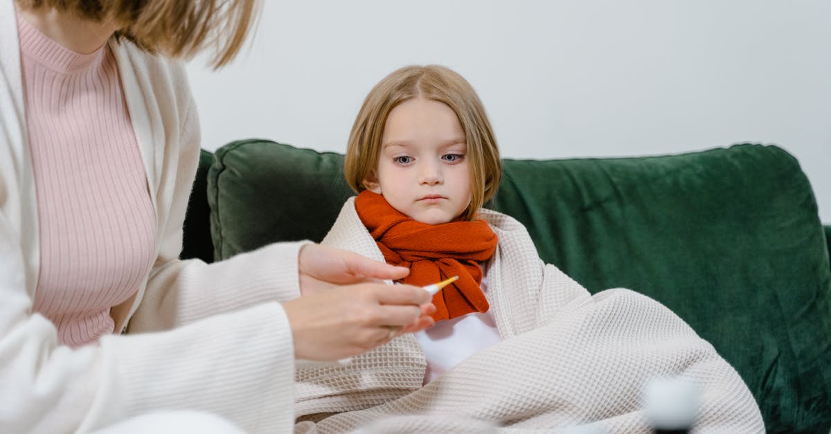 Temperature probe recommendations? - Woman in White Sweater Holding Baby in Orange and White Sweater