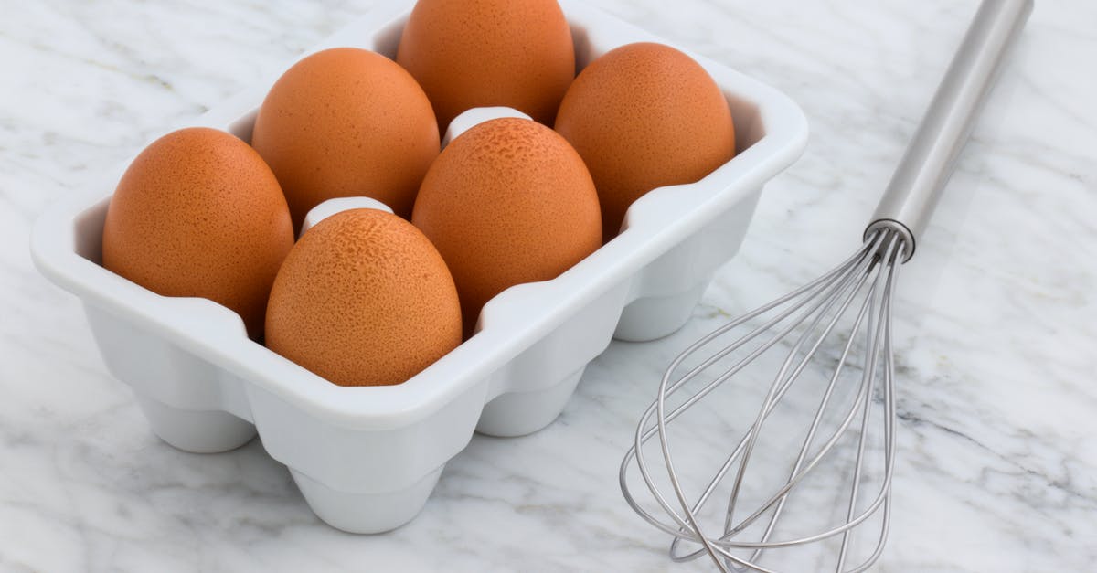 Testing For Salmonella in raw eggs - Six Brown Eggs With Tray