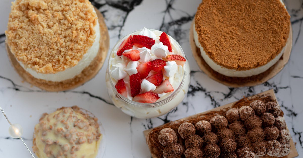 Tiramisu tastes bitter. How to fix this - Set of delicious deserts on marble table